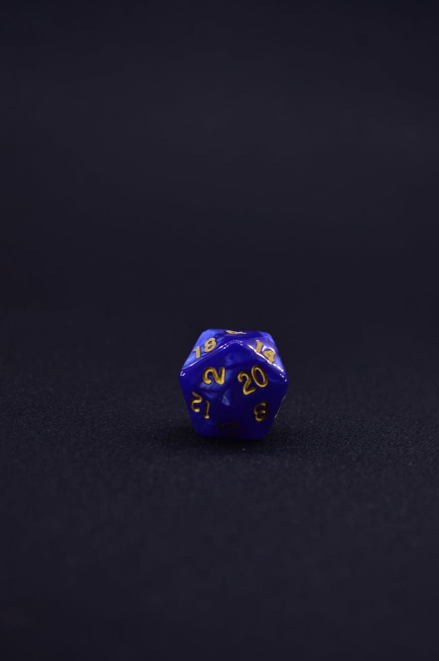 blue dice on black background